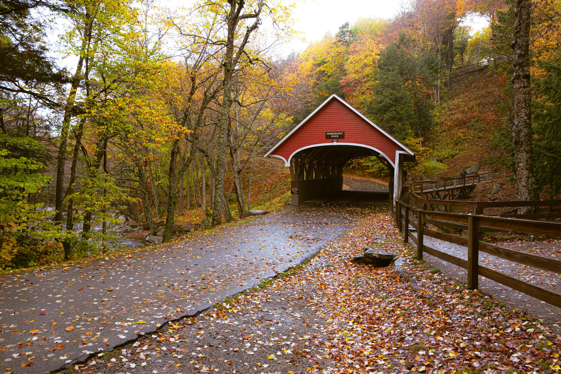 scenic autumn covered bridge in new hampshire, home of the current use assessment